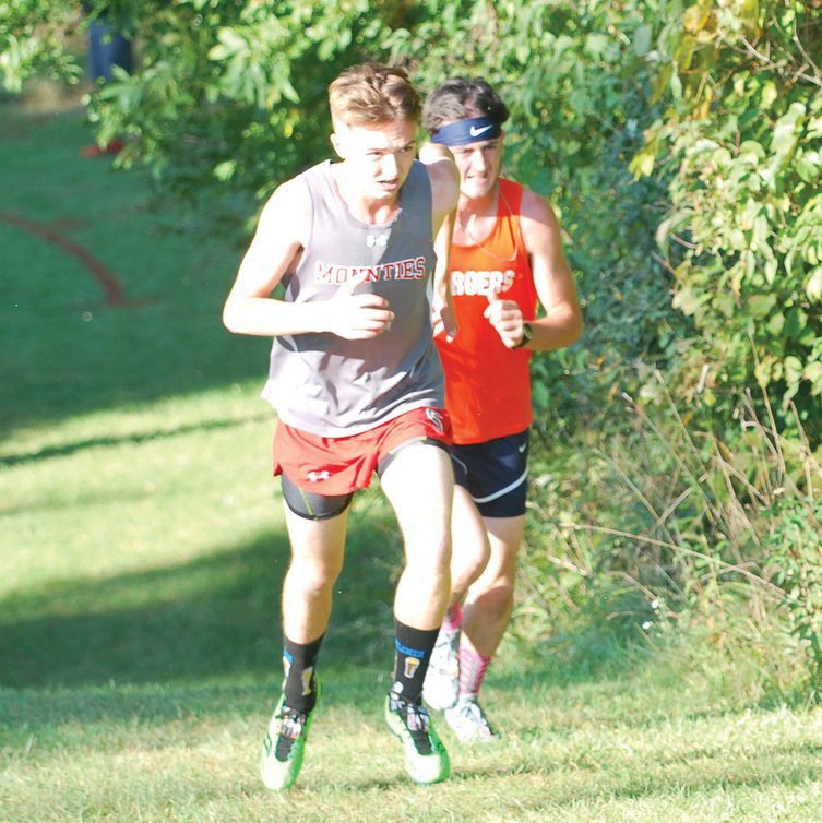 Mason Cass and Eliah McCartney have developed a friendly rivalry as the two best runners in the county.